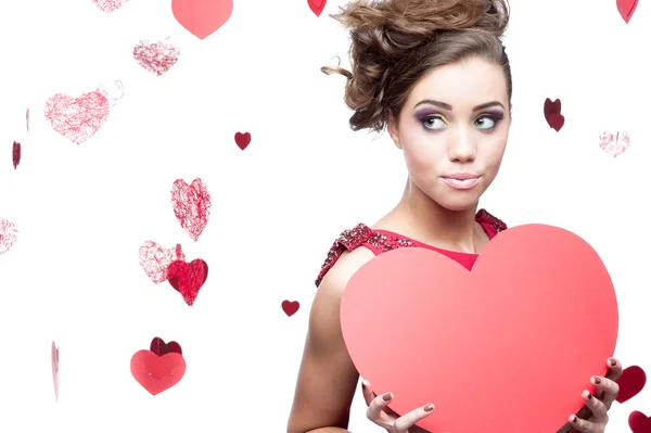 Young cheerful woman holding red paper heart — Stock Photo, Image