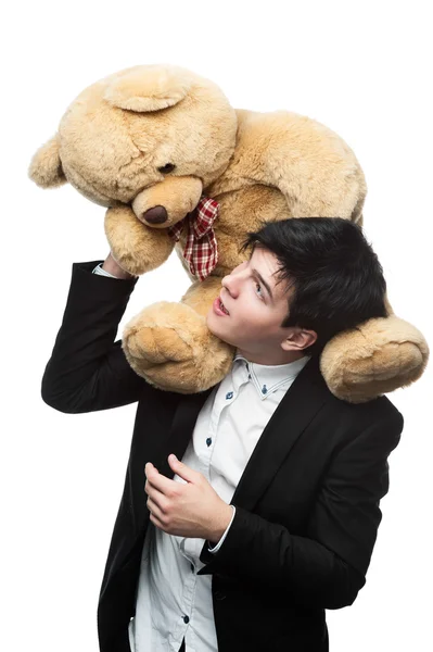 Businessman with big soft toy on shoulders — Stock Photo, Image