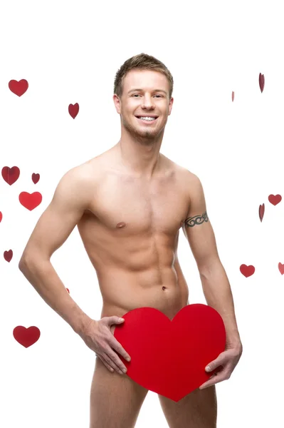 Grappige naakte man met grote rode papier hart — Stockfoto