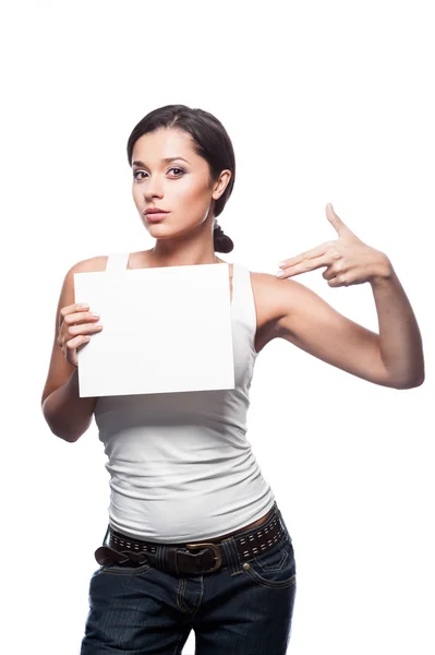 Casual young brunette girl holding sign — Stock Photo, Image