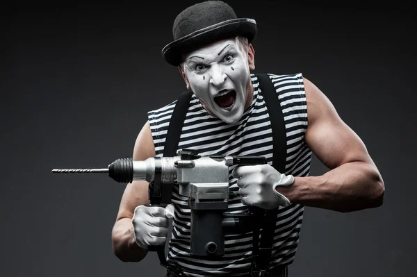 Mime with hammer drill — Stock Photo, Image