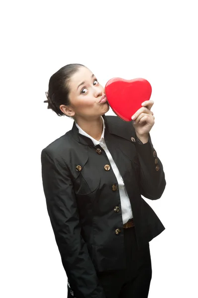 Young business woman holding red heart — Stock Photo, Image