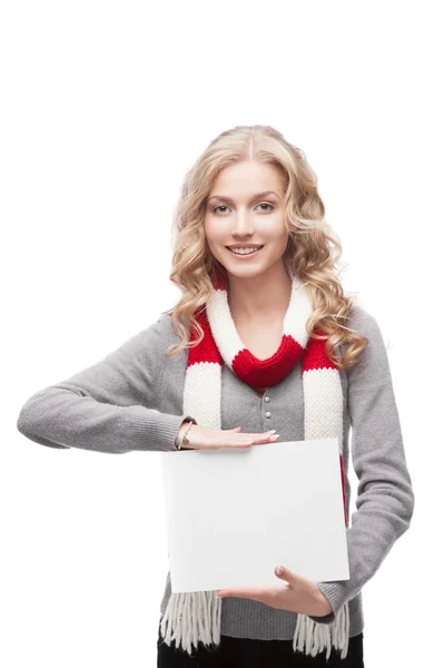 Young smiling woman holding sign — Stock Photo, Image