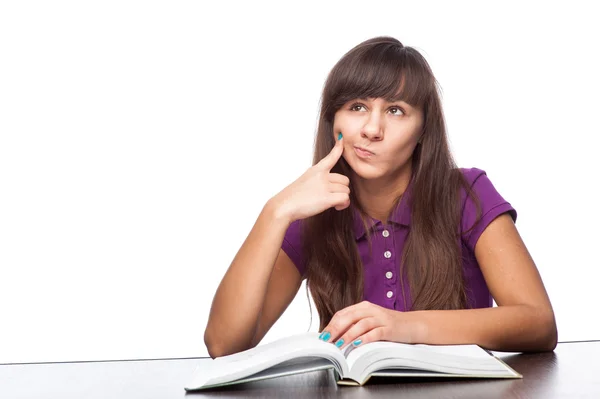 Pensativo chica con libro — Foto de Stock