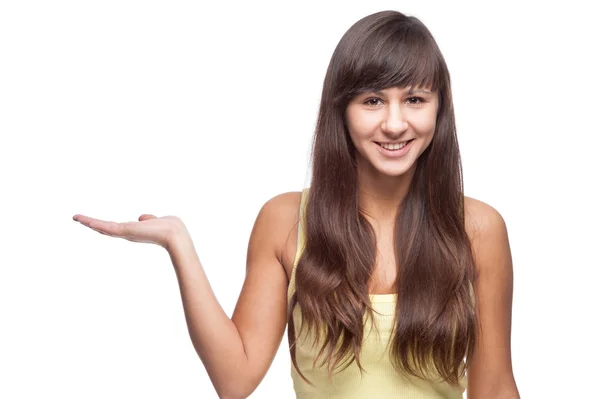 Girl pointing at empty space — Stock Photo, Image
