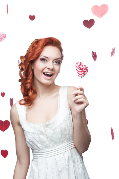 Happy red woman holding lollipop — Stock Photo, Image