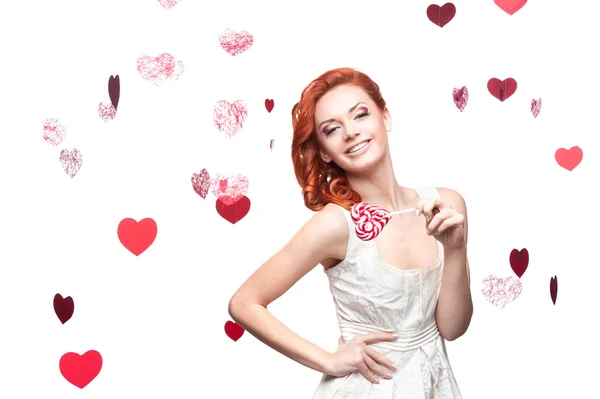 Happy red woman holding lollipop — Stock Photo, Image