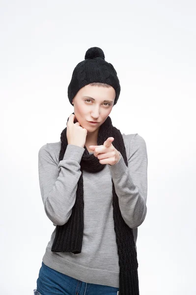 Young tricky girl on gray background — Stock Photo, Image