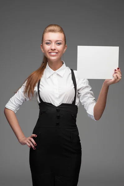 Attraktive Geschäftsfrau mit Schild — Stockfoto