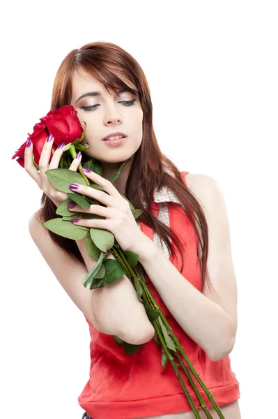 Chica sosteniendo rosas rojas —  Fotos de Stock