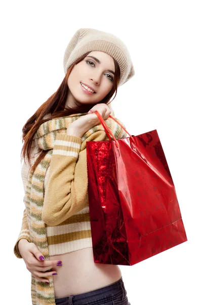 Chica sosteniendo bolsa de compras roja Fotos de stock libres de derechos