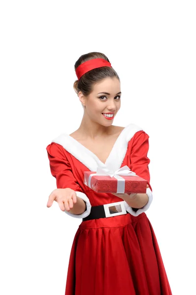 Cheerful retro girl holding christmas gift — Stock Photo, Image