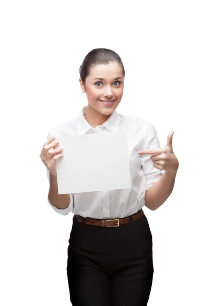 Young cheerful businesswoman holding sign — Stock Photo, Image