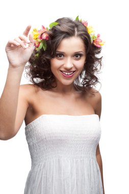 smiling young woman with flower in hair