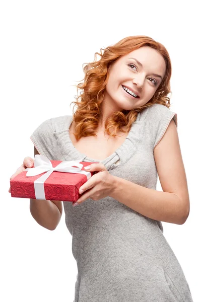 Joven mujer casual acaparando regalo de Navidad —  Fotos de Stock