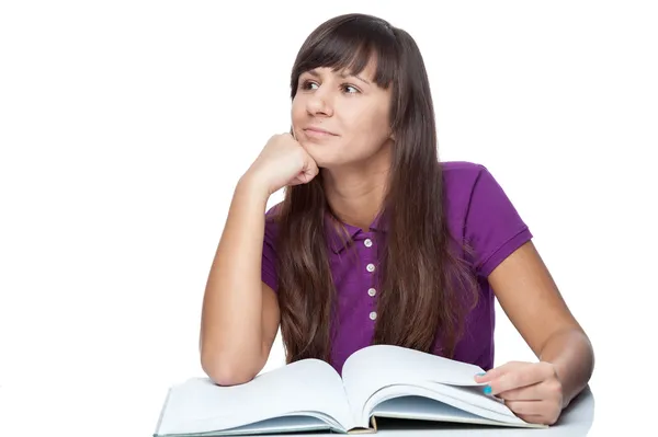Attractive caucasian thoughtful girl with book — Stock Photo, Image