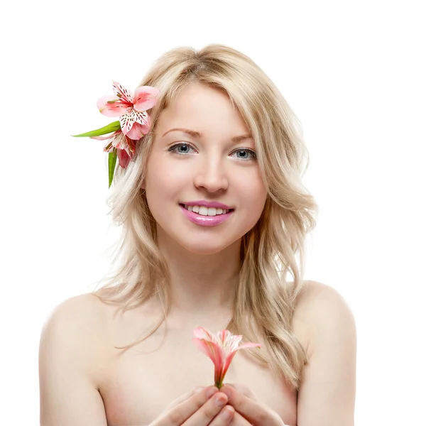Attractive caucasian girl holding flower Stock Picture