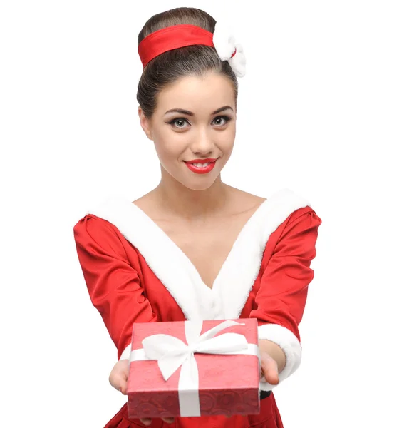 Cheerful retro girl holding red gift — Stock Photo, Image