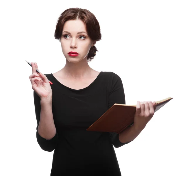 Thoughtful business woman with diary — Stock Photo, Image