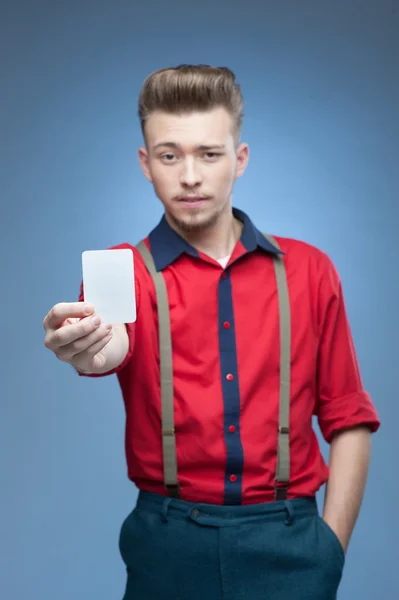 young retro man holding empty card