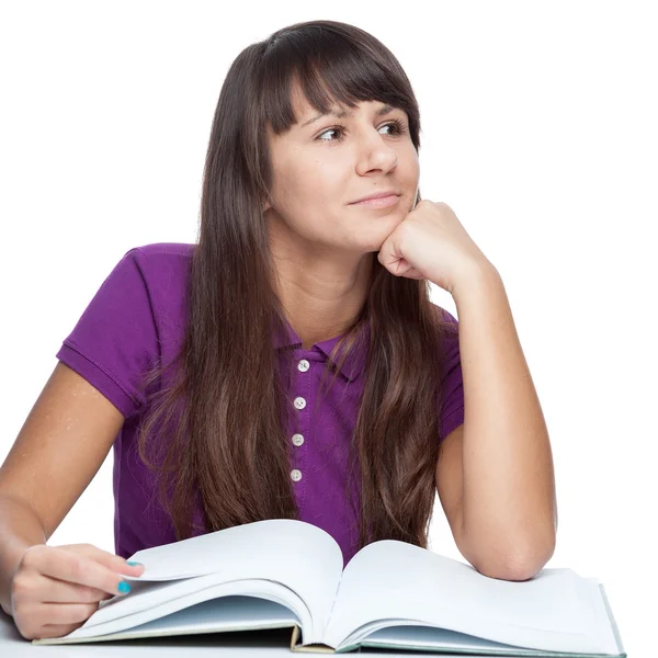 Attractive caucasian thoughtful girl with book — Stock Photo, Image