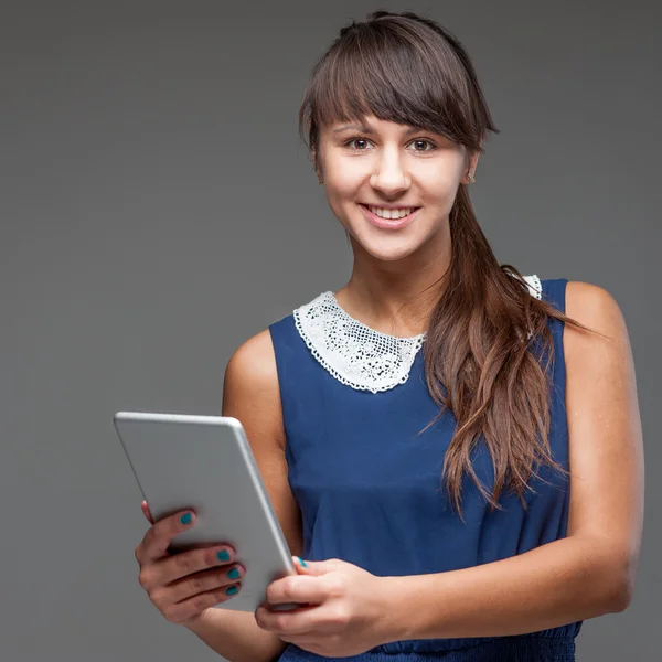 Girl holding tablet — Stock Photo, Image