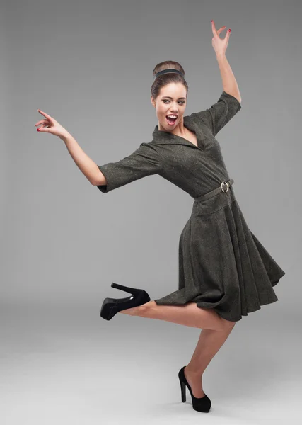 Cheerful dancing retro girl — Stock Photo, Image