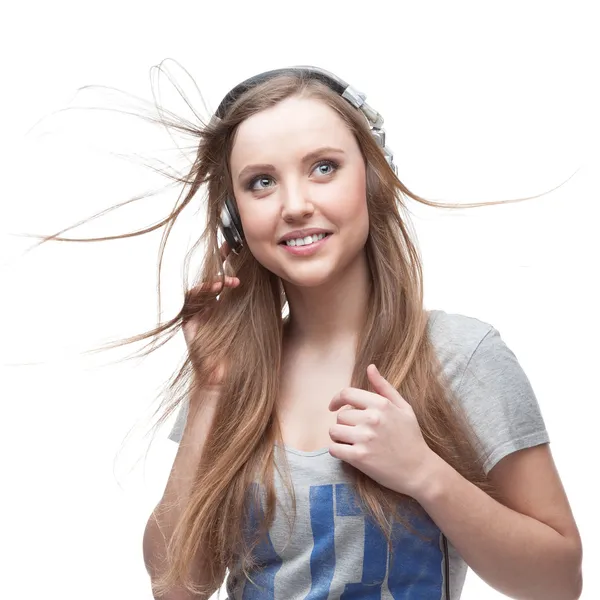 Menina música casual no branco — Fotografia de Stock