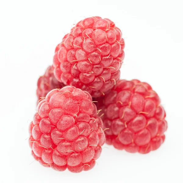 Red raspberry lying in form of pyramid — Stock Photo, Image