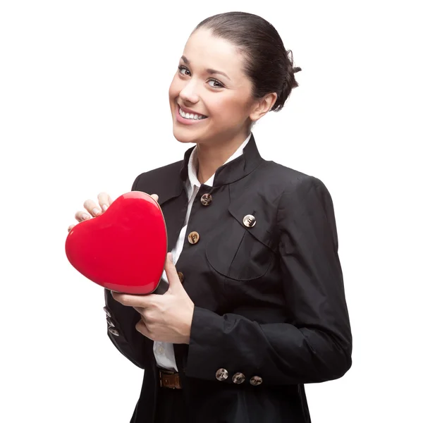 Mulher de negócios segurando coração vermelho — Fotografia de Stock