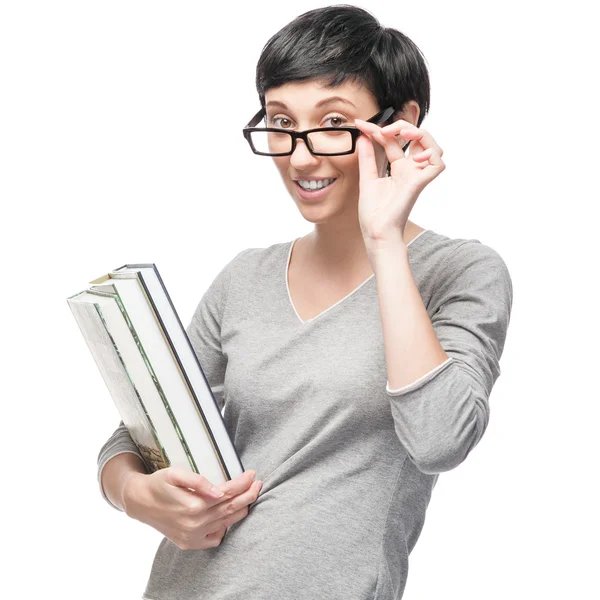 Весела випадкова жінка тримає книги — стокове фото