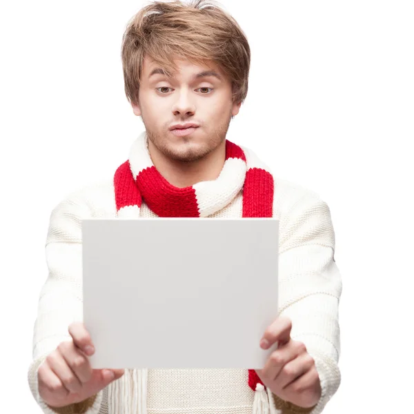 Young funny man holding sign — Stock Photo, Image