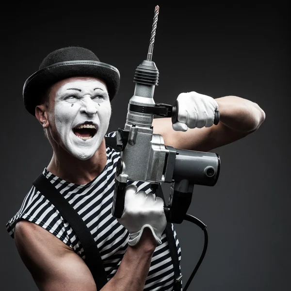Mime with hammer drill — Stock Photo, Image