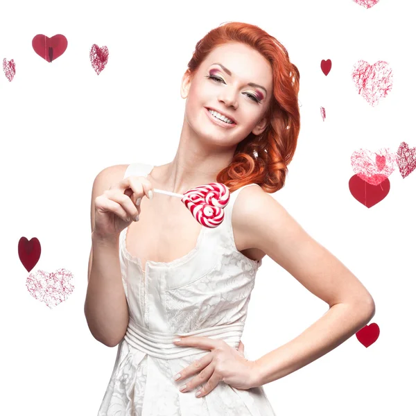 Happy red woman holding lollipop — Stock Photo, Image