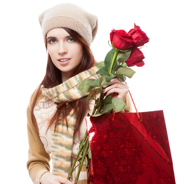 Menina segurando saco de compras vermelho — Fotografia de Stock