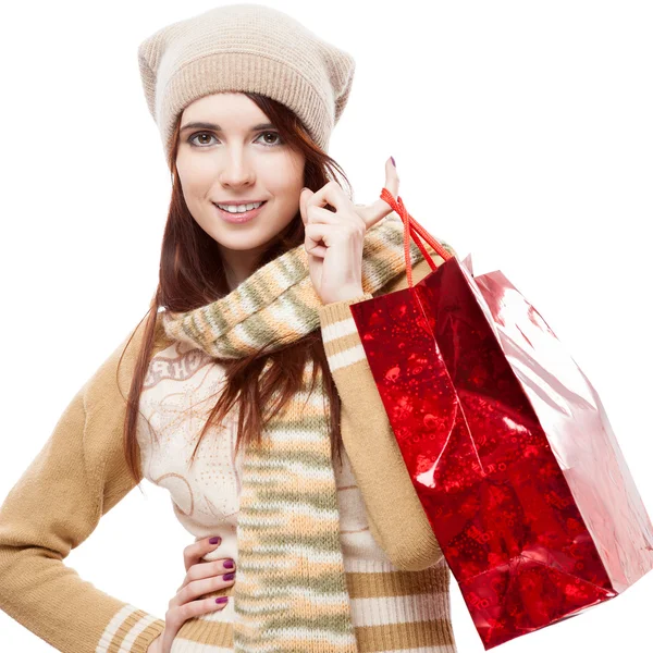 Girl holding red shopping bag — Stock Photo, Image