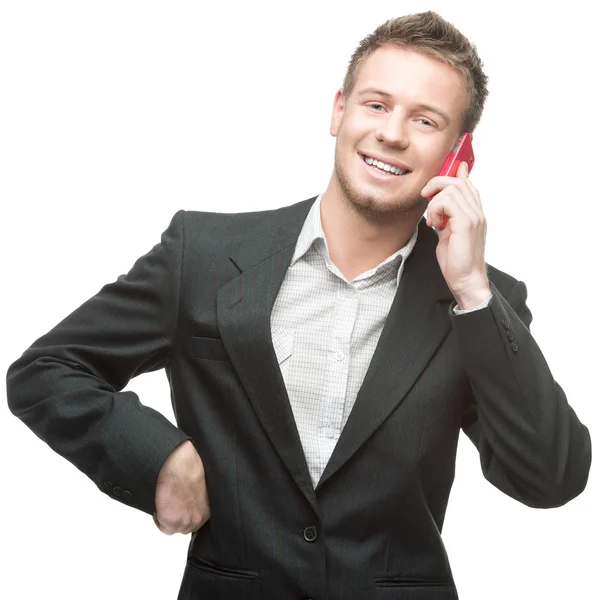 Businessman holding pink cell phone — Stock Photo, Image