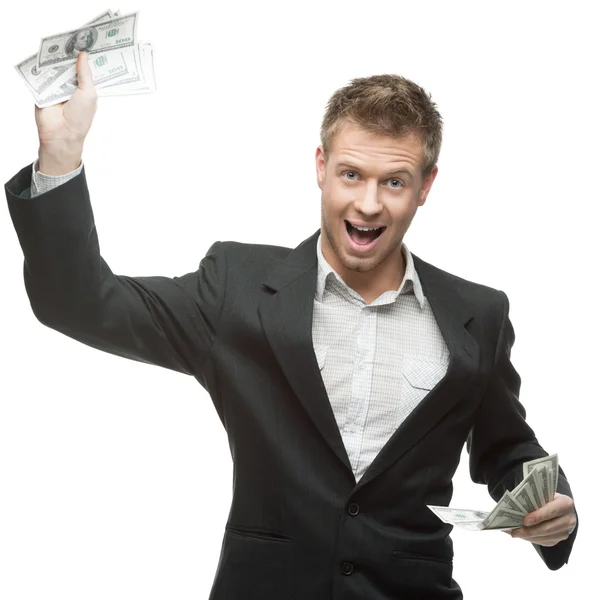 Young successful screaming businessman holding money — Stock Photo, Image