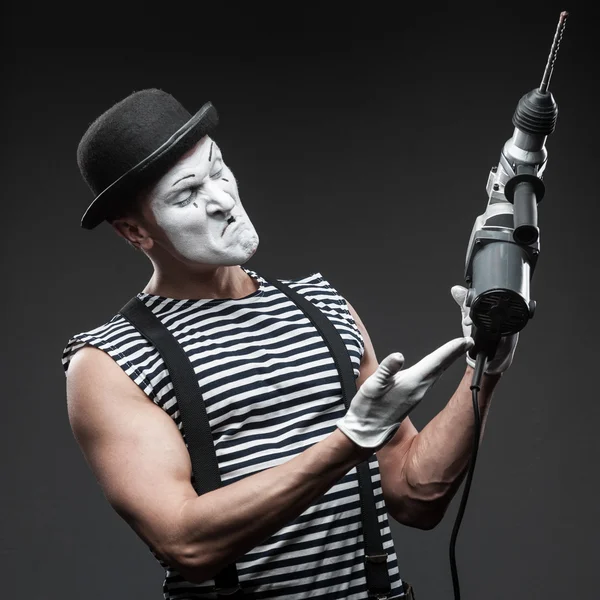 Mime with hammer drill — Stock Photo, Image