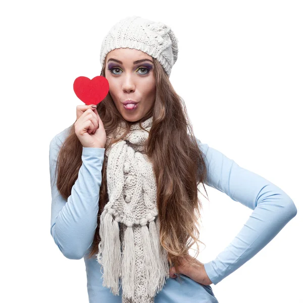 Young cheerful casual woman holding red heart — Stock Photo, Image