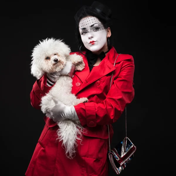 Woman mime with puppy — Stock Photo, Image