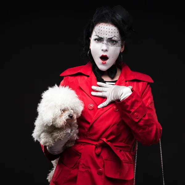 Woman mime with puppy — Stock Photo, Image