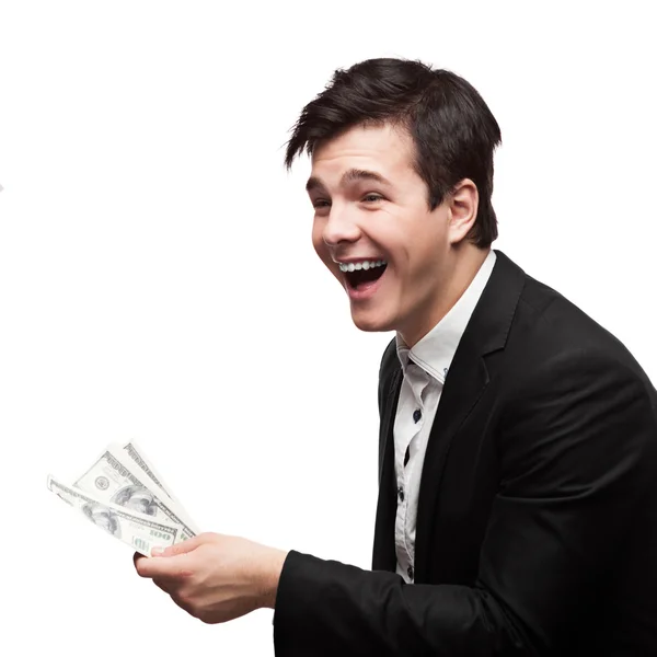 Young happy businessman holding money — Stock Photo, Image