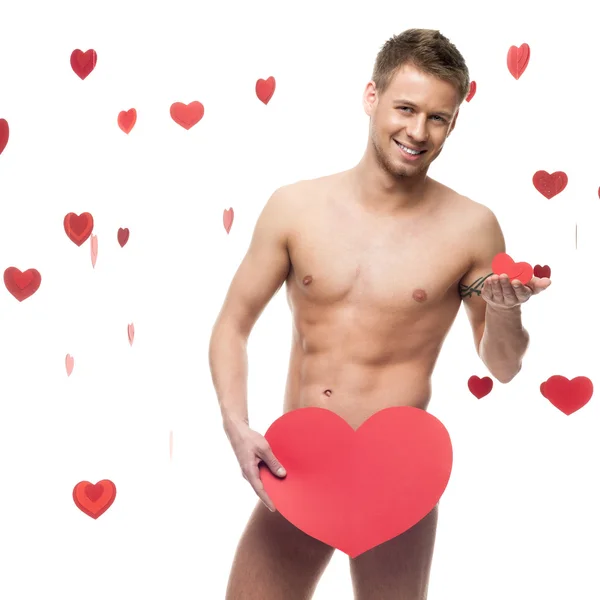 Legrační nahý muž, který držel velké červené papírové srdce — Stock fotografie