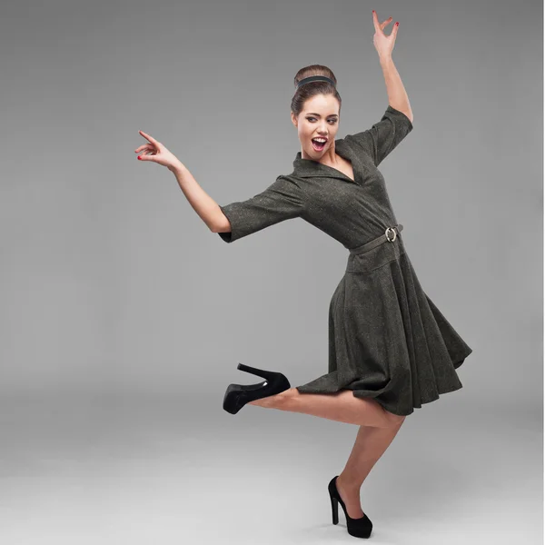 Cheerful dancing retro girl — Stock Photo, Image