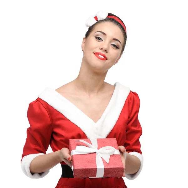 Cheerful retro girl holding christmas gift — Stock Photo, Image