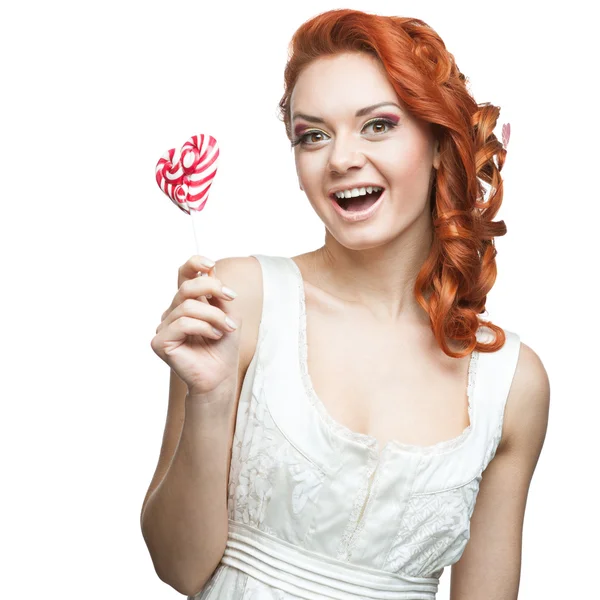 Mutlu kırmızı kadın holding lolipop — Stok fotoğraf