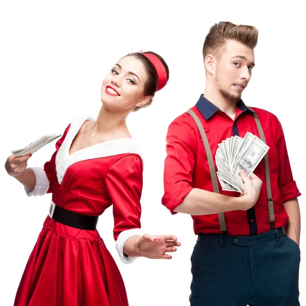 Young retro couple holding money — Stock Photo, Image