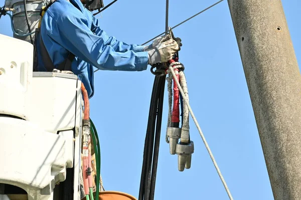 Scene of electric wire construction work. Background image of a work site.