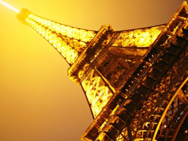 Paris at night with lights - The Eiffel tower. clipart